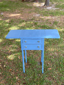 Antique drop leaf sewing table